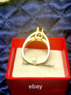 14KT Solid Heavy Yellow Gold Ring. 50CTW Imperial Topaz A very rare gemstone