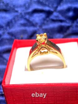14KT Solid Heavy Yellow Gold Ring. 50CTW Imperial Topaz A very rare gemstone