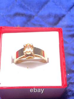14KT Solid Heavy Yellow Gold Ring. 50CTW Imperial Topaz A very rare gemstone