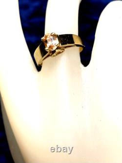 14KT Solid Heavy Yellow Gold Ring. 50CTW Imperial Topaz A very rare gemstone